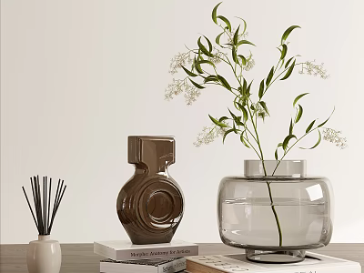Decorative Ornament Combination With Reed Diffuser Brown Ceramic Clear Glass Vases Greenery And Stacked Books 3d model