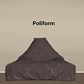 Poliform Gray Bean Bag Chair With LV Logo On Beige Wall Wooden Floor