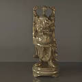 Golden Ornamental Sculpture With Intricate Carving Details And Decorative Base