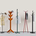 Colorful Coat Racks With Various Designs Holding Dresses Shirts And Hats For Home Use