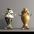 Elegant Decorative Vases With Colorful Floral Pattern And Gold Carved Design On Gray Tabletop