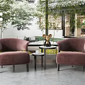 Modern Leisure Sofa Set with Two Pink Chairs Small Round Table and Green Plants