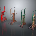 Vintage Hand Trucks In Red Brown And Green With Metal Frames And Wheels