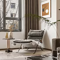 Soft Gray Accent Chair with Cushions by Window with Side Table Vase and Green Plant