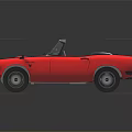 Vintage Red Convertible Car With Classic Body Design And Open Top