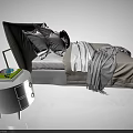Cozy Double Bed With Gray Headboard Pillows Blanket And Bedside Table With Books Blue Bowl