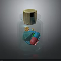 Clear Transparent Glass Bottle With Golden Lid And Colorful Geometric Shapes Inside