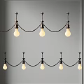 Two Rows of Minimalist Pendant Lights with White Bulbs Dark Metal Frames and Grey Wall