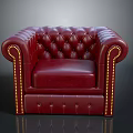 Classic Red Leather Tufted Armchair Featuring Elegant Brass Nailhead Trim Design