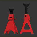 Pair Of Red Jack Stands With Black Top And Tripod Base On Dark Reflective Surface
