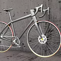 Sleek Silver Road Bicycle With Curved Handlebars Red Yellow Rim Accents Against Gray Wall