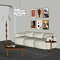 Beige Fabric Three Seater Sofa In Modern Living Room With Artwork And Floor Lamp