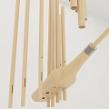 Handcrafted Artistic Wooden Musical Instrument With Stick In White Room Corner