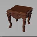 Traditional Red Wooden Table With Intricate Carvings On Legs And Frame