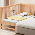 Wooden Toddler Bed with Yellow Blanket Stuffed Toys Next to Adult Bed and Nightstand Lamp