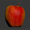 Fresh Red and Yellow Apple on Dark Glossy Surface with Vibrant Colors