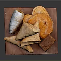 Freshly Baked Flaky Pastries and Assorted Bread Loaves on Wooden Board