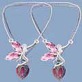Silver Necklaces With Fairy Shaped Pendants Pink Wings And Red Gemstone Bases