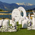 Scenic Garden Landscape With White Floral Archway Circular Ornament Pillars Lawn Lake And Mountain Backdrop