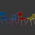 Colorful Blue Green Red And Yellow Chairs With Metal Legs And Floor Reflections