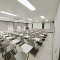 Modern Office Hallway With Gray Walls Seats Ceiling Lights And Tile Floor