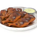 Golden Brown Roasted Chicken Drumsticks With creamy Dip Sauce On Platter