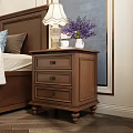 Brown Wooden Nightstand With Fringed Table Lamp Purple Flower Vase And Three Drawers