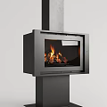 Sleek Modern Black Cylindrical Fireplace With Burning Wood And Flames Inside
