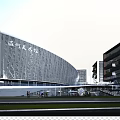 Modern Shopping Mall Building With Glass Curtain Wall Facade And Pedestrians At Dusk
