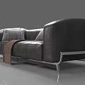 Modern Leather Sectional Sofa with Gray Throw Pillow Brown Blanket and Sleek Metal Legs