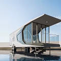 Modern Guesthouse Building With Glass Facade Sloped Roof Over Water Terrace