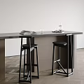 Modern Black Bar Stools At Kitchen Counter With Books Glass And Bottle