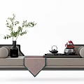 Elegant Modern Daybed with Decorative Pillows Tea Set and Potted Plants