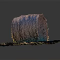 Round Hay Bale Resting on Green Grass in Outdoor Rural Setting