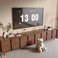 Cozy TV Stand With Multiple Drawers And Cabinets Holding TV Green Plants And Stuffed Toy