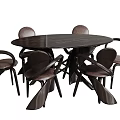 Round Dark Table and Chair Set with Unique Curved Backrest Chairs Modern Interior Furniture