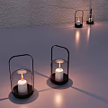 Decorative Ornament Set With Glass Lanterns Black Metal Handles Lit White Candles And Light Shadows