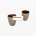 Two Elegant Beige Tea Cups With Textured Surface And Dark Interior On White Background