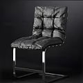 Modern Black Leather Office Chair With Diamond Stitching And Metal Frame Design