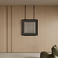 Black Framed Textured Artwork Hanging On Wooden Wall With Small Sculpture