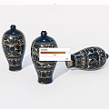 Three Traditional Ceramic Vessels With Black And Gold Floral Patterns And Lids