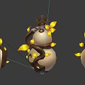 Three Small Oval Shaped Figures Wrapped With Brown Vines And Yellow Leaves