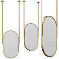 Elegant Modern Golden Hanging Oval Mirrors with Sleek Metal Frames