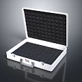 Open White Case With Black Foam Padding And Silver Handle Design
