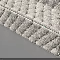 Household Cleaning Sponge With Stacked Design Black Top And White Textured Surface