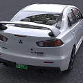 White Mitsubishi Sports Car With Green License Plate