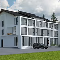 Modern Guesthouse Building With White Exterior Large Glass Windows Green Lawn And Mountain View