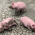 Three Pink Reptiles Crawling On Dry Cracked Earth Surface Ground