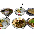 Assorted Asian Noodle Soups with Egg Meatballs and Vegetables in Decorative Bowls