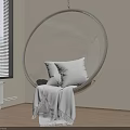 Transparent Acrylic Hanging Chair With White Cushions And Blanket In Living Room
